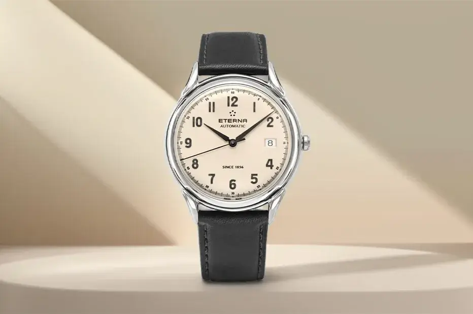 Hodinky Eterna 1948 Gent Automatic s krémovým ciferníkem a černým řemínkem – klasický retro styl