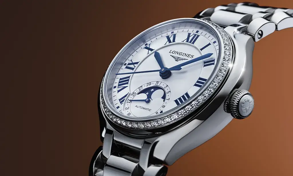 Dámské hodinky Longines PrimaLuna Moonphase Automatic s ocelovým náramkem a ciferníkem s měsíčními fázemi