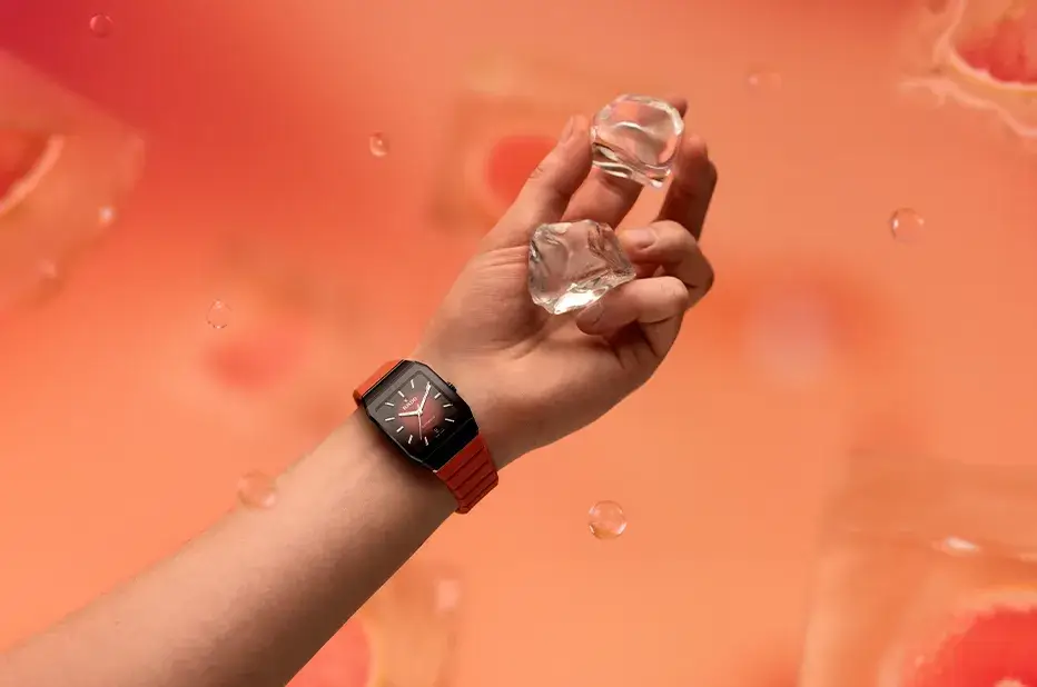 Hodinky Rado Anatom Automatic R10201409 s červeným řemínkem – dynamický model na pozadí růžového grepu