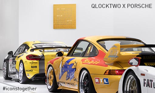 Vozy Porsche a hodiny Qlocktwo